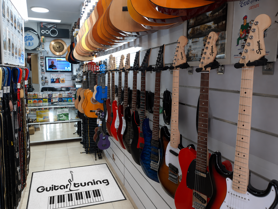 Guitar Tuning Tienda Entrada